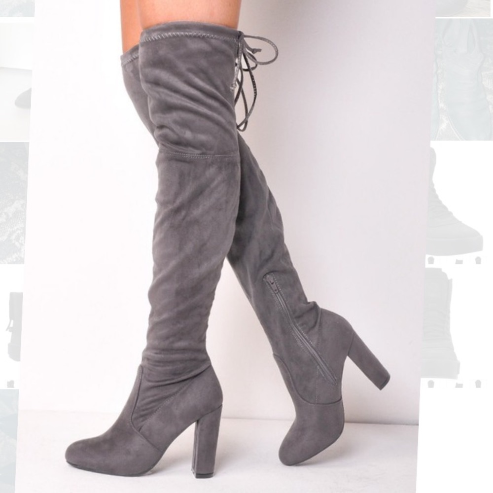 Grey thigh high, heeled boots
